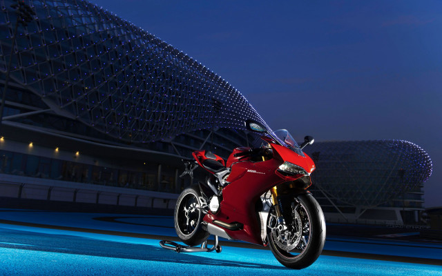 Red motorcycle night city skyline free wallpaper for desktop - medium preview image