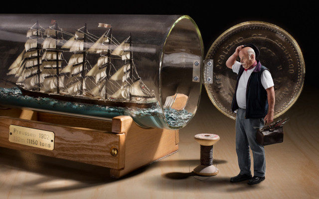 Man bottle ship spinning wheel free wallpaper for desktop - medium preview image