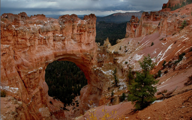 Mountain arch forest cloudy sky free wallpaper for desktop - medium preview image