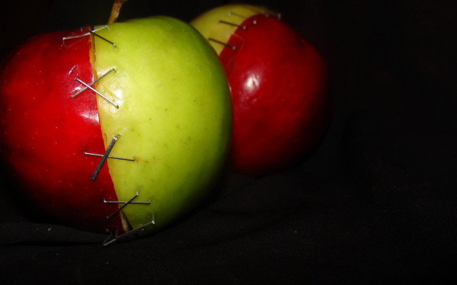 Two apples pins black surface free wallpaper for desktop - medium preview image