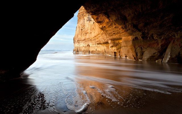 Cave ocean beach waves bridge free wallpaper for desktop - medium preview image