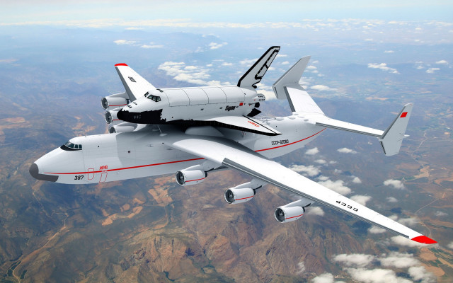 Jetliner flying mountain range red free wallpaper for desktop - medium preview image