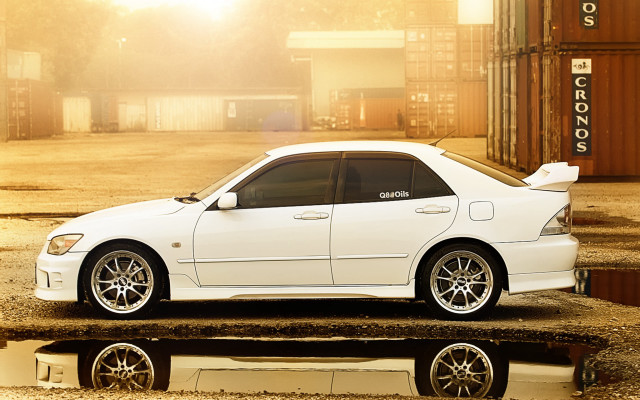 White car parking lot container free wallpaper for desktop - medium preview image