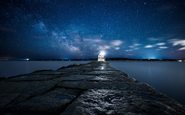 Pier lighthouse night sky stars free wallpaper for desktop - medium preview image
