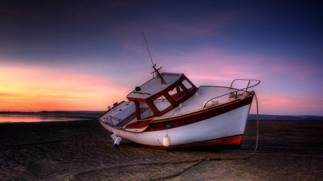Boat beach sunset water sky free wallpaper for desktop - medium preview image