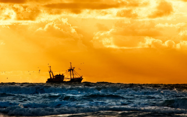 Boat ocean yellow sky clouds #2 free wallpaper for desktop - medium preview image