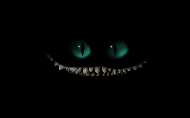 Glowing green eyes smile dark free wallpaper for desktop - medium preview image