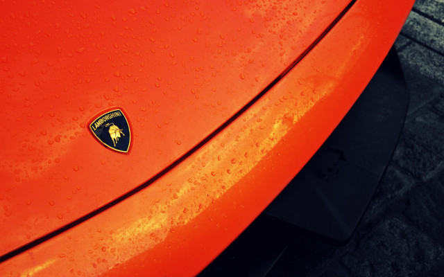 Red car black emblem brick free wallpaper for desktop - medium preview image