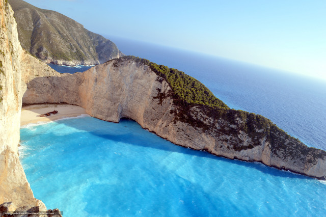 Large rock formation water cliff free wallpaper for desktop - medium preview image