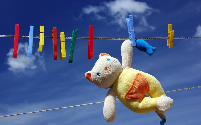 Stuffed animal clothesline blue sky free wallpaper for desktop - medium preview image