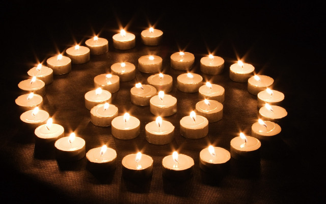 Candles lit circle dark background free wallpaper for desktop - medium preview image