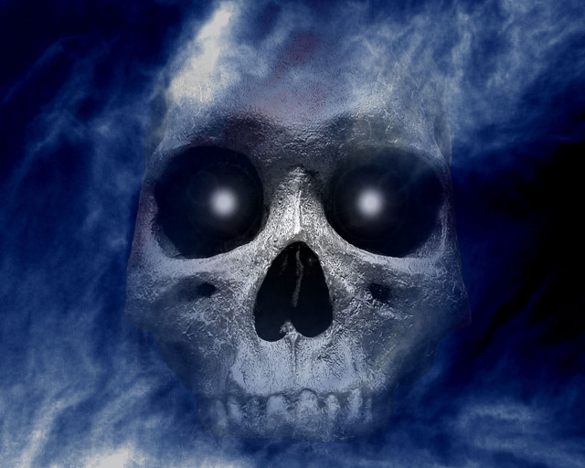Skull glowing eyes gothic planet free wallpaper for desktop - medium preview image