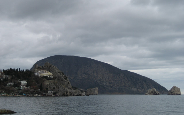 Mountain village ocean cloudy sky free wallpaper for desktop - medium preview image