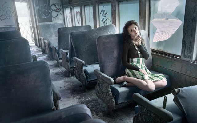 Woman sitting train seat handbag free wallpaper for desktop - medium preview image