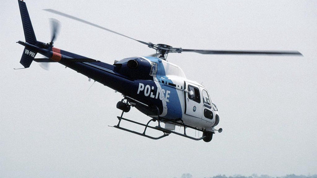 Police helicopter landing gear person free wallpaper for desktop - medium preview image