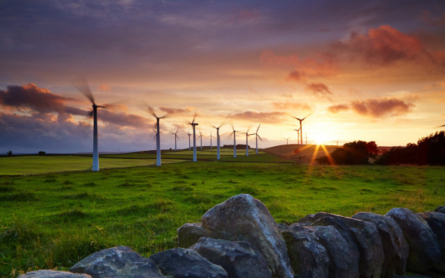 Sunset windmills field clouds horizon free wallpaper for desktop - medium preview image