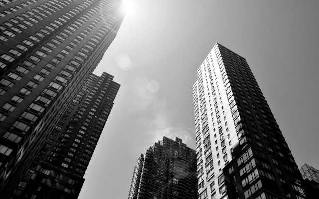 Black white tall buildings sunshine free wallpaper for desktop - medium preview image