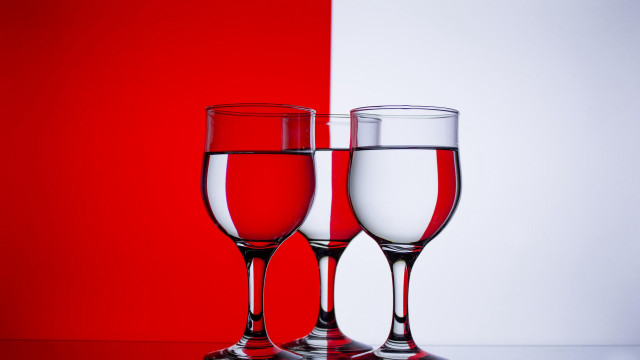 Wine glasses red background white free wallpaper for desktop - medium preview image