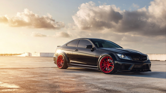 Black car red rims cloudy #3 free wallpaper for desktop - medium preview image