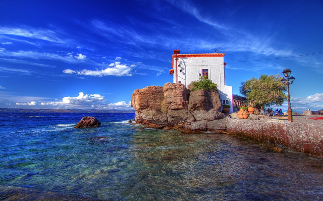Lighthouse rock ocean blue sky free wallpaper for desktop - medium preview image
