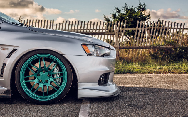 Silver car green rim pastel free wallpaper for desktop - medium preview image