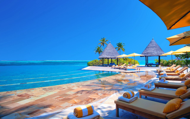 Beach resort pool lounge chairs free wallpaper for desktop - medium preview image