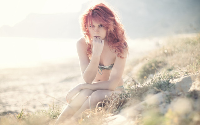 Beach woman redhair bikini sitting free wallpaper for desktop - medium preview image