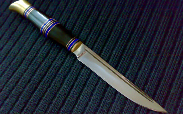 Gold handle knife blue surface free wallpaper for desktop - medium preview image