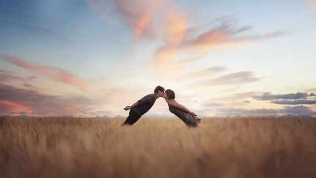 Couple kissing field sunset clouds free wallpaper for desktop - medium preview image