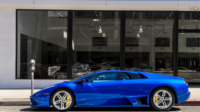 Blue sports car parking meter free wallpaper for desktop - medium preview image