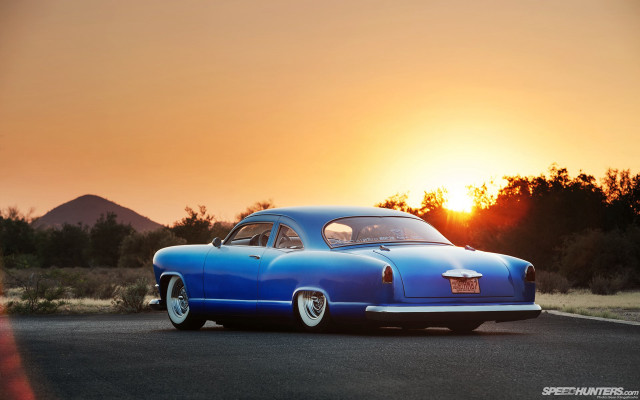 Blue car sunset road mountains free wallpaper for desktop - medium preview image