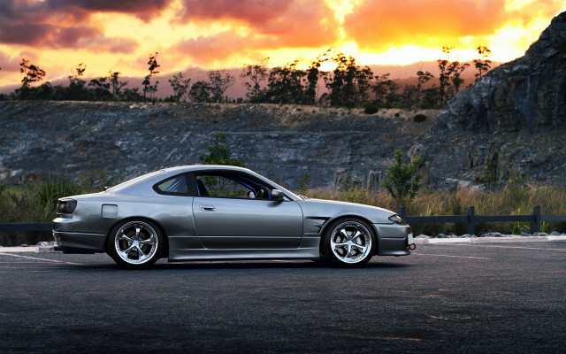 Silver car sunset clouds rimlight free wallpaper for desktop - medium preview image