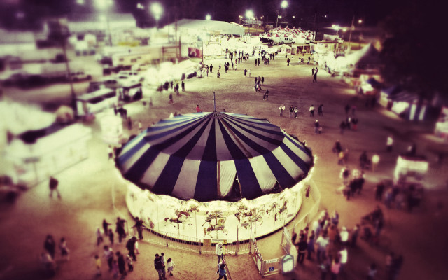 Carousel night tiltshift tent people free wallpaper for desktop - medium preview image