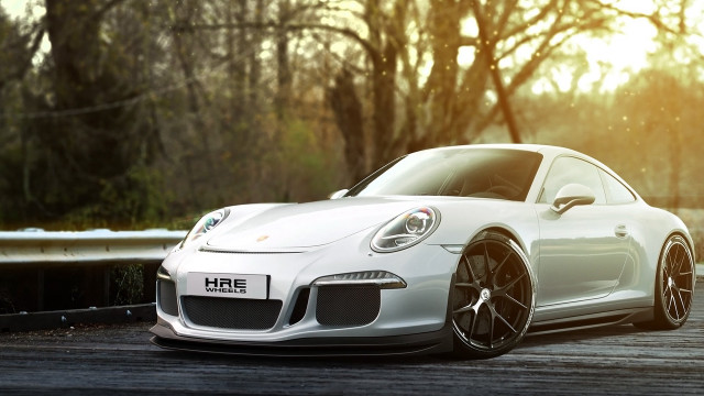 White porsche sports car forest free wallpaper for desktop - medium preview image