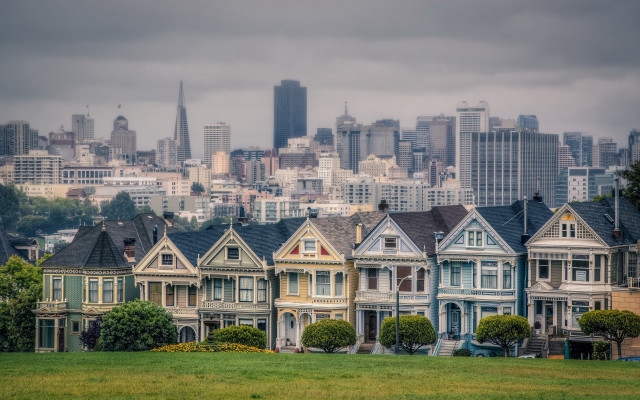 Cityscape houses cloudy sky green free wallpaper for desktop - medium preview image