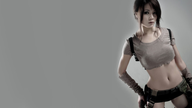 Woman gun shirt gray background free wallpaper for desktop - medium preview image
