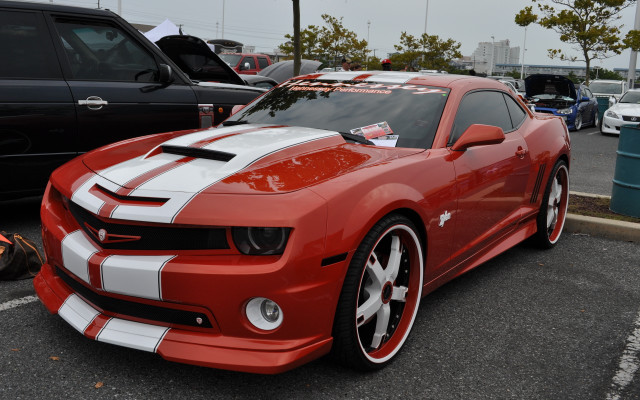 Red car white stripes parking free wallpaper for desktop - medium preview image