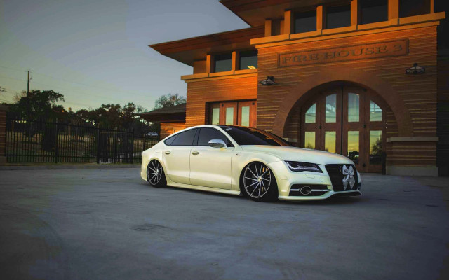 White car gated entrance city free wallpaper for desktop - medium preview image