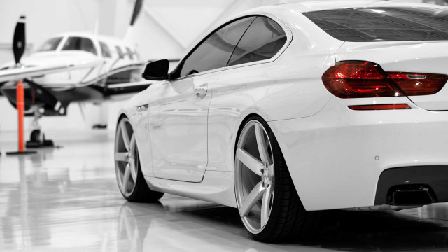 White car garage small plane free wallpaper for desktop - medium preview image