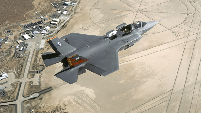 Fighter jet desert town road free wallpaper for desktop - medium preview image