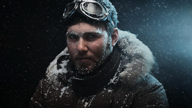 Snowy astronaut goggles citylights aurora free wallpaper for desktop - medium preview image