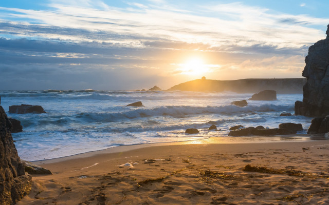 Beach rock formation sunset waves free wallpaper for desktop - medium preview image