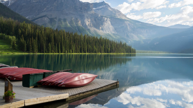 Dock canoes mountain lake clouds free wallpaper for desktop - medium preview image