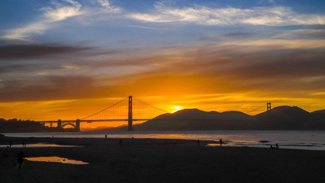 Sunset bridge water clouds cityscape free wallpaper for desktop - medium preview image