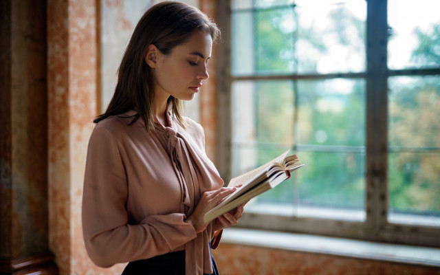 Woman reading infront window book free wallpaper for desktop - medium preview image