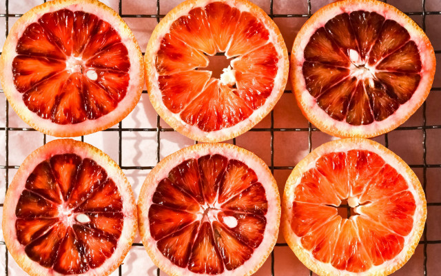 Grapefruits halved wire rack table free wallpaper for desktop - medium preview image