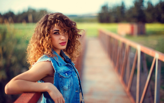 Woman curly hair bridge serious #2 free wallpaper for desktop - medium preview image