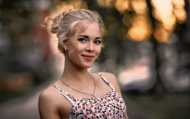 Woman bun smiling blue eyes free wallpaper for desktop - medium preview image
