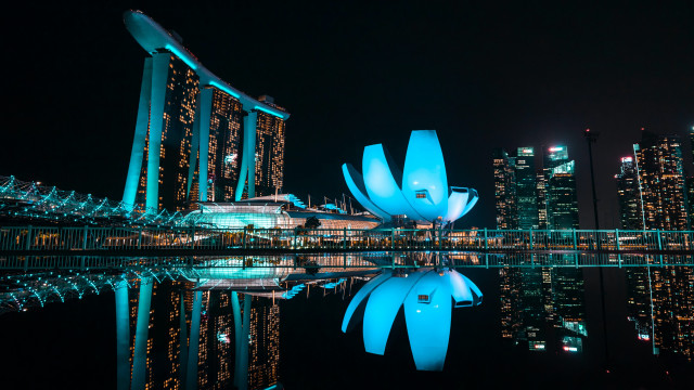 Adrian zingg building cityscape night free wallpaper for desktop - medium preview image