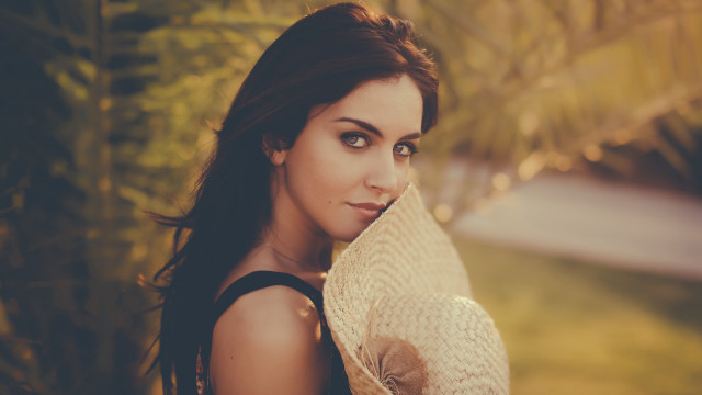 Woman hat portrait park blurry free wallpaper for desktop - medium preview image